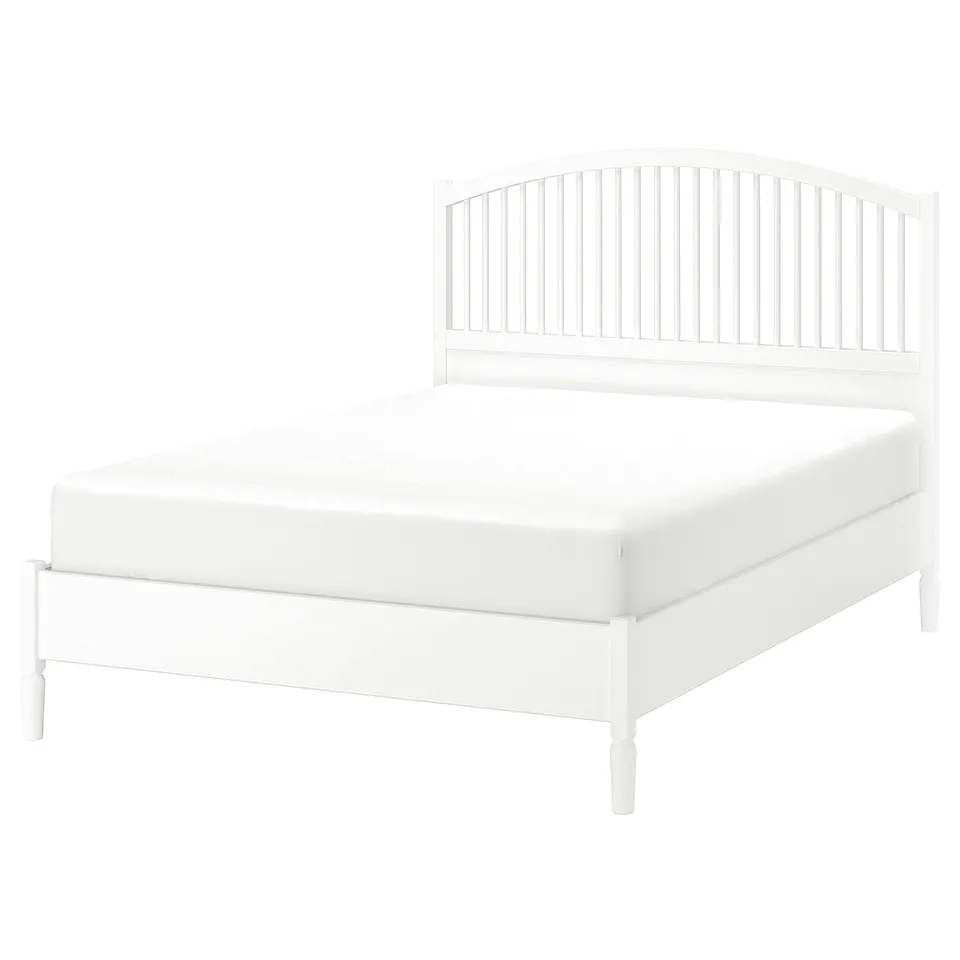 White TYSSEDAL bed, sleek design, wooden spindles, high back, clean lines.