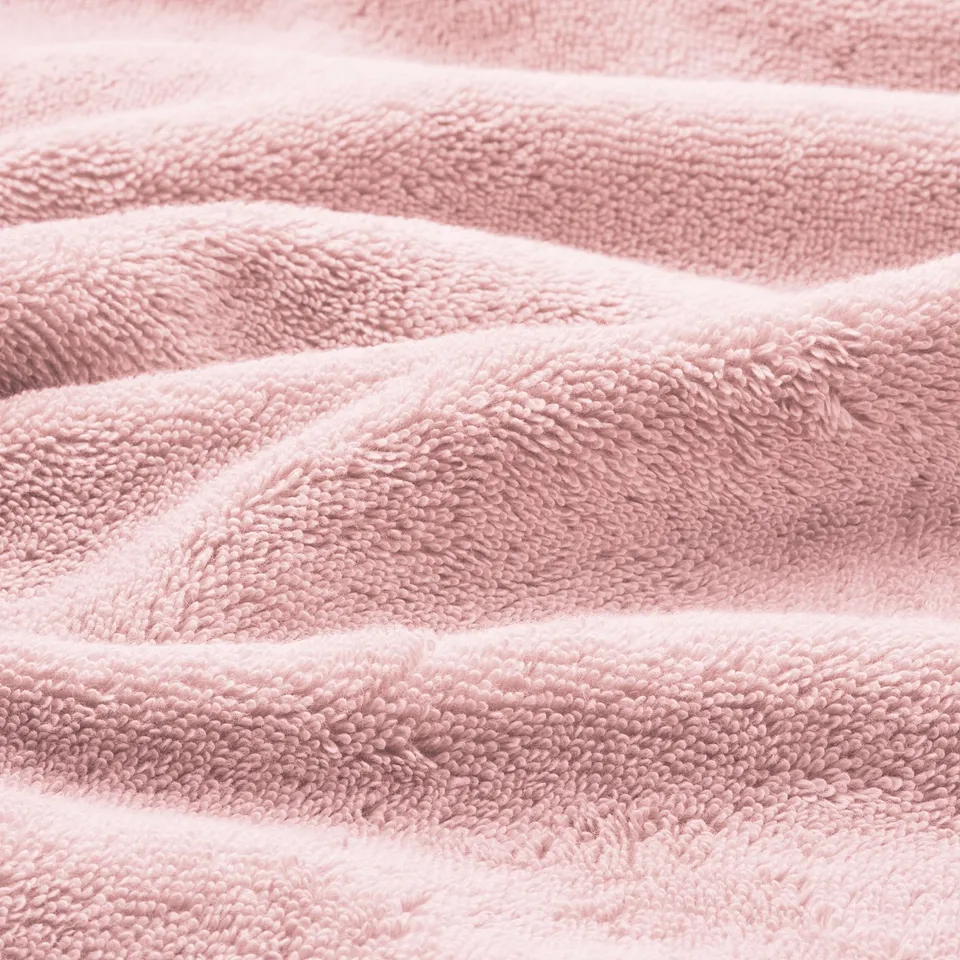 Close-up of soft, plush towels showcasing high-quality texture and craftsmanship.