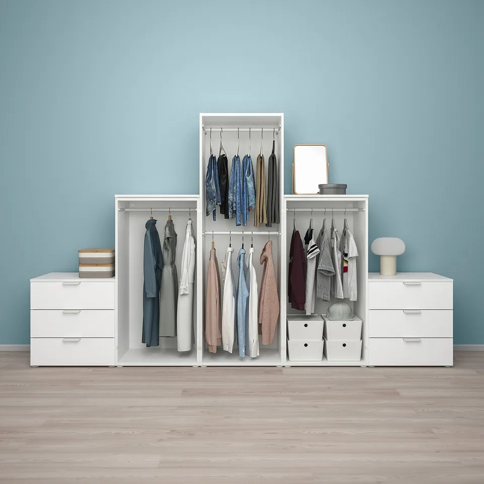 Modern closet with hangers, drawers, and storage boxes. Adjustable, can fit various spaces. Blue wall background.