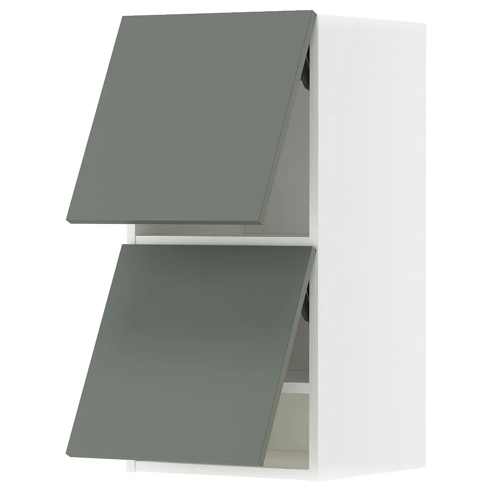 Two greenish-grey wall cabinets with white frames, stacked vertically, minimalist design.