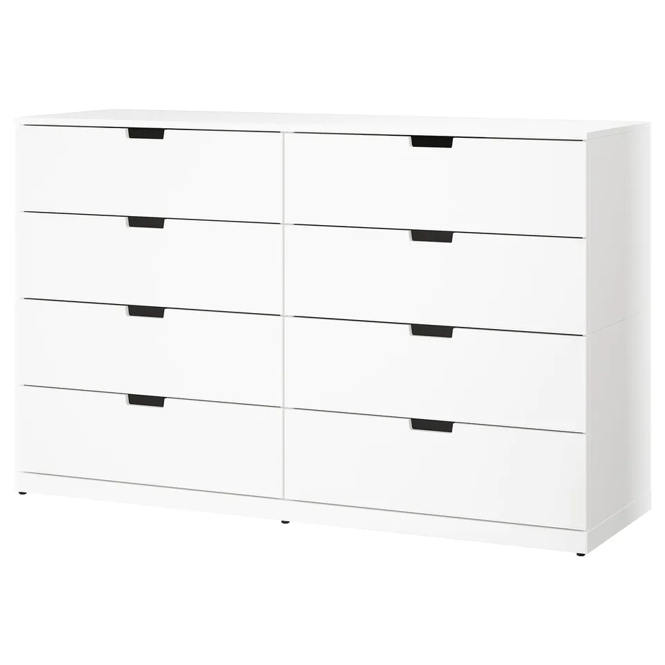 White NORDLI 6-drawer chest: minimalist, rectangular, modern design with black handles.