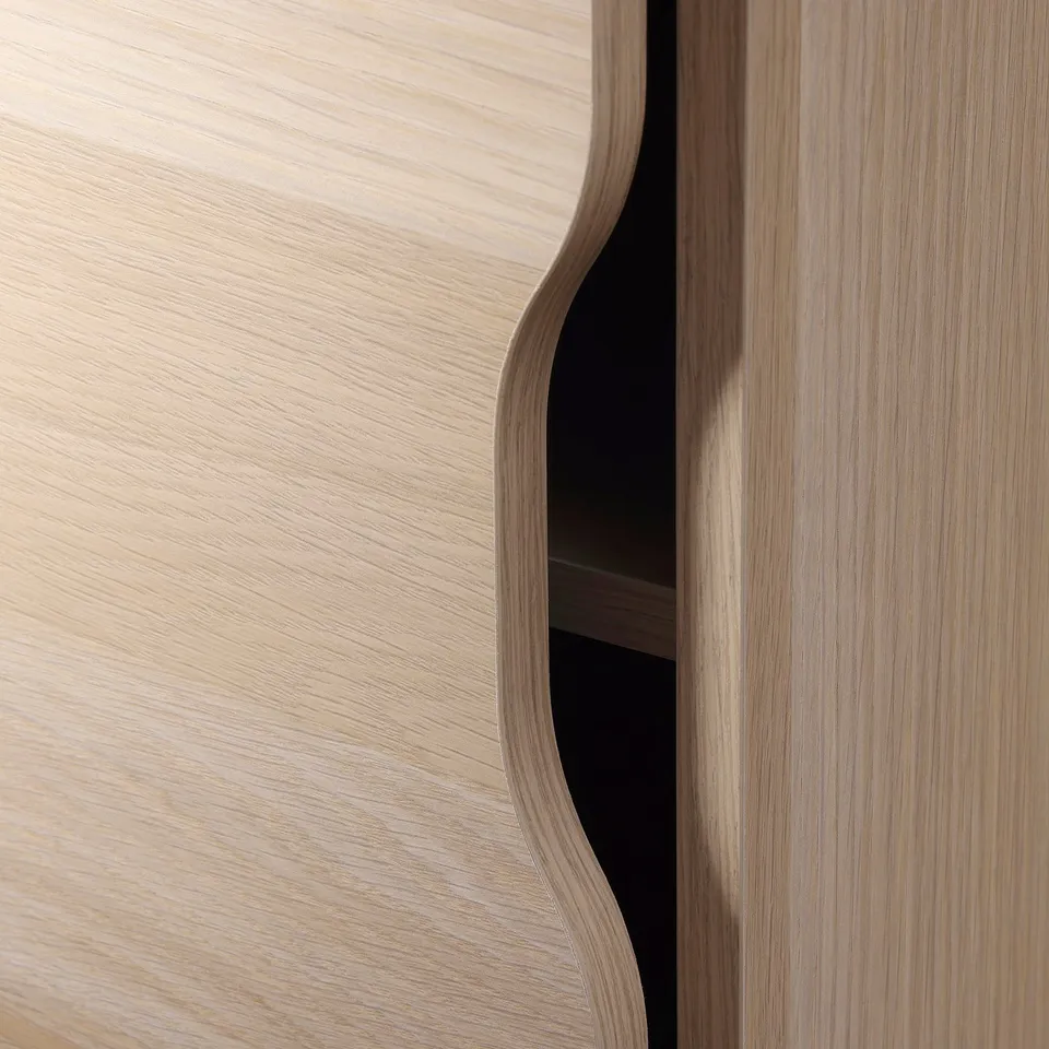 Light wood panel close-up. Smooth surface, seamless join. Modern, clean design.