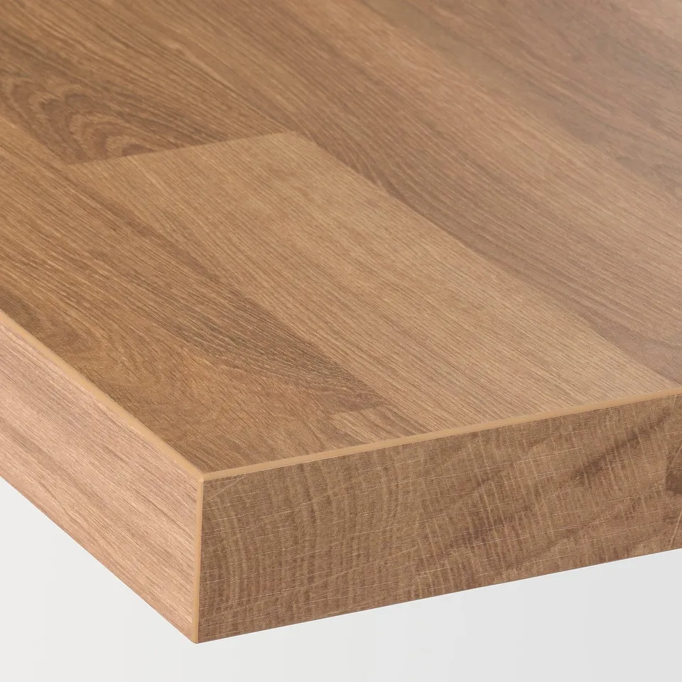 A sleek, smooth wooden countertop with a clean edge, showcasing a polished, warm natural wood finish.
