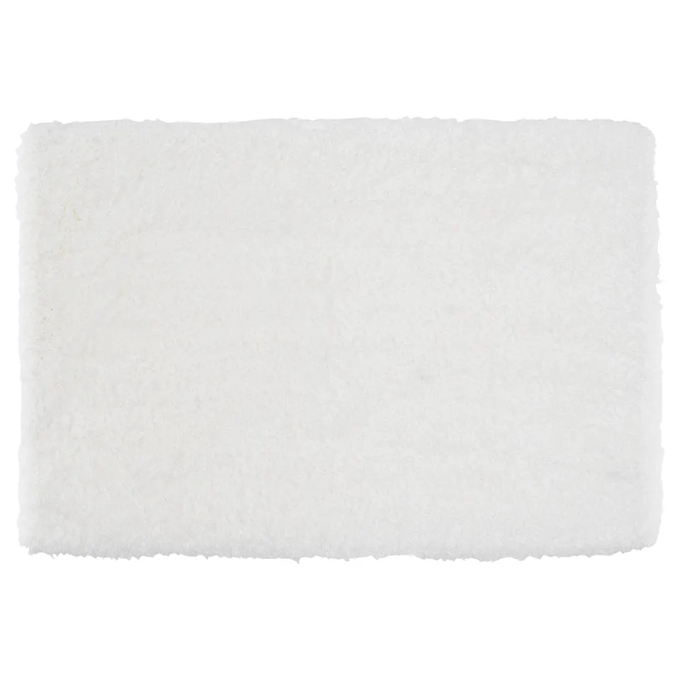 A white ALMTJÄRN bath mat, rectangular, with a soft microfibre top, and a latex backing for grip.