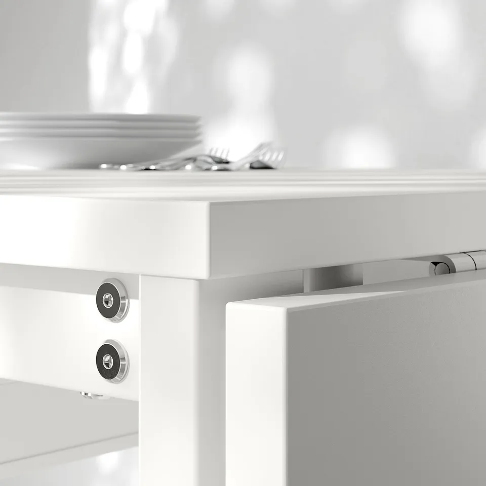 Modern, compact dining table with sleek white finish. Folds neatly for space-saving. Quality steel hinges ensure durability.