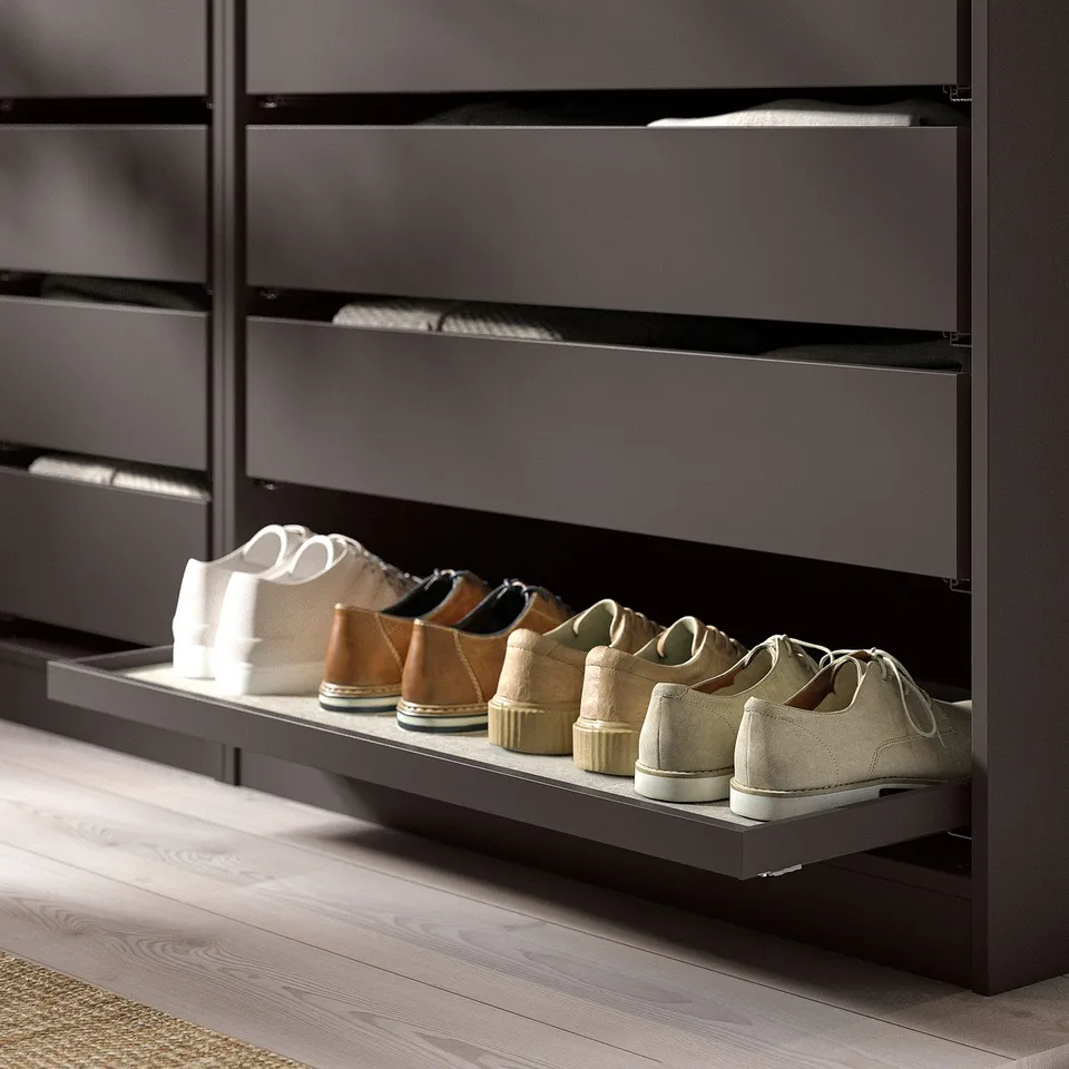 Modern grey shoe tray for closet, holds multiple pairs of shoes.