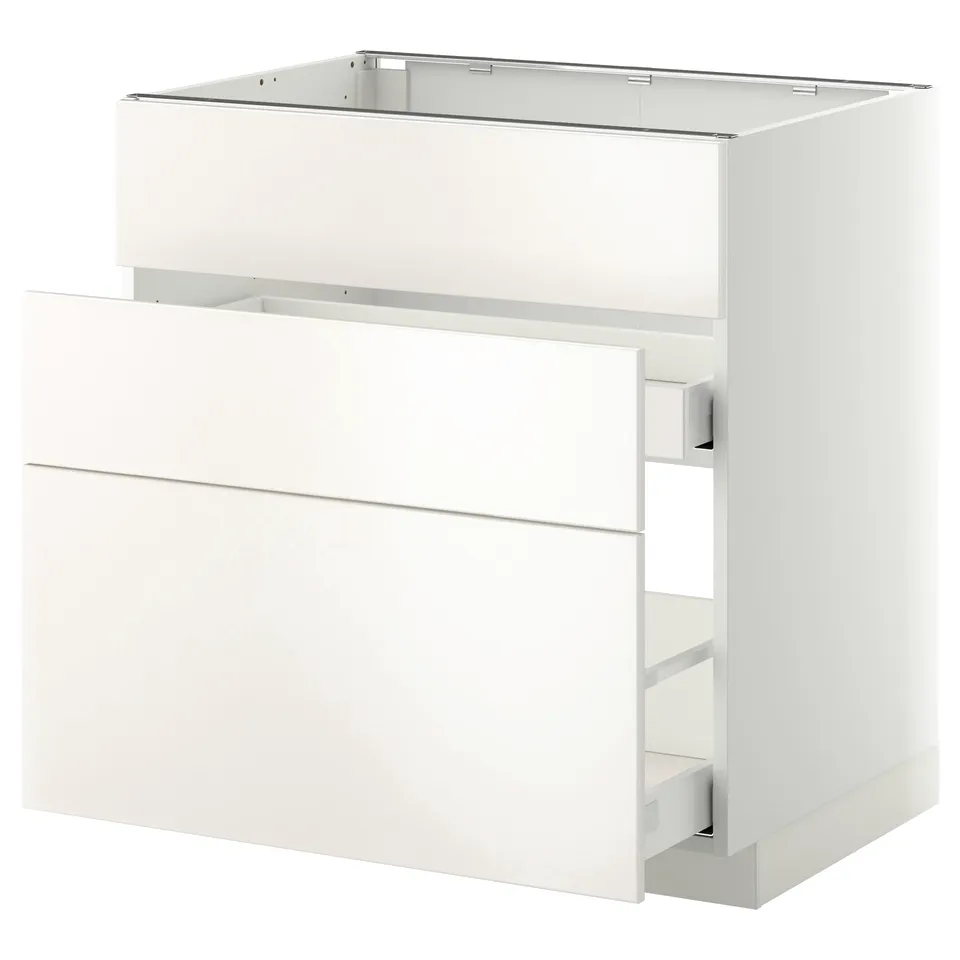 White METOD kitchen cabinet, sleek design with smooth drawers.