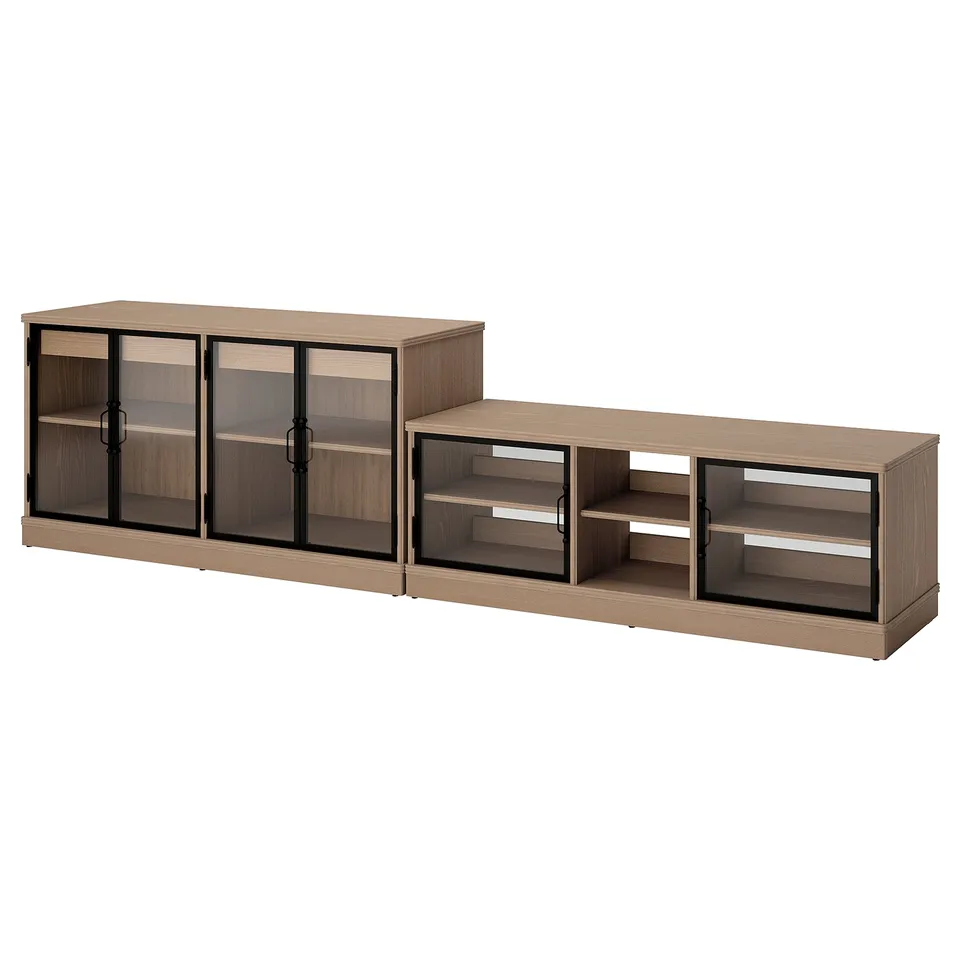 Modern wooden tv stand with glass doors, light brown finish.