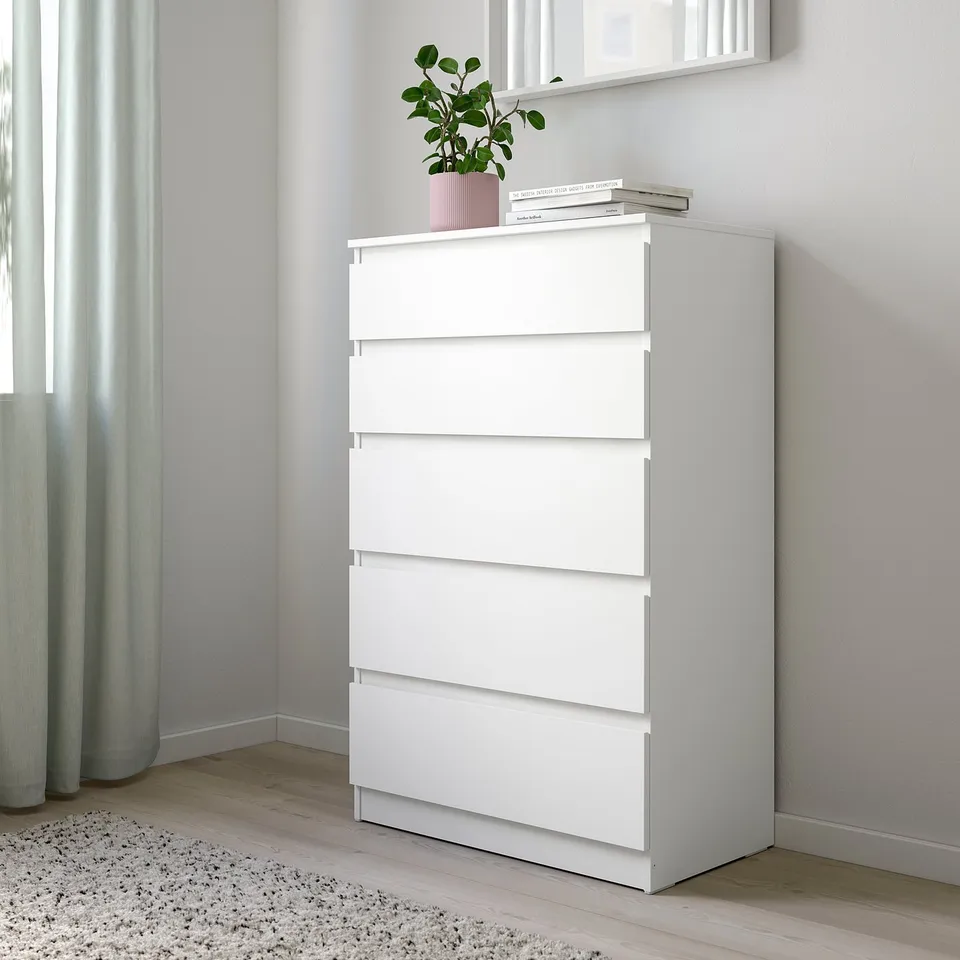 KULLEN chest w/ 5 drawers, plant, books, & anchored