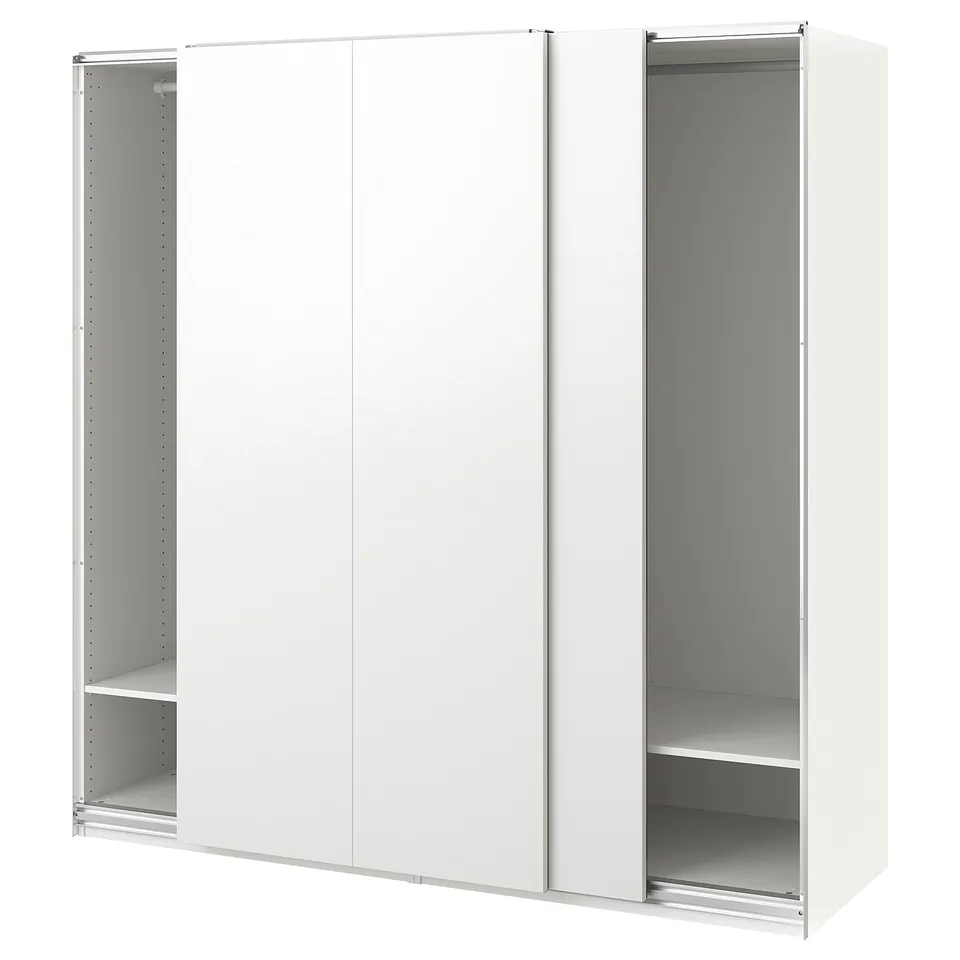 A white ikea PAX wardrobe with glass doors. It has a modern design and sliding doors for space efficiency.