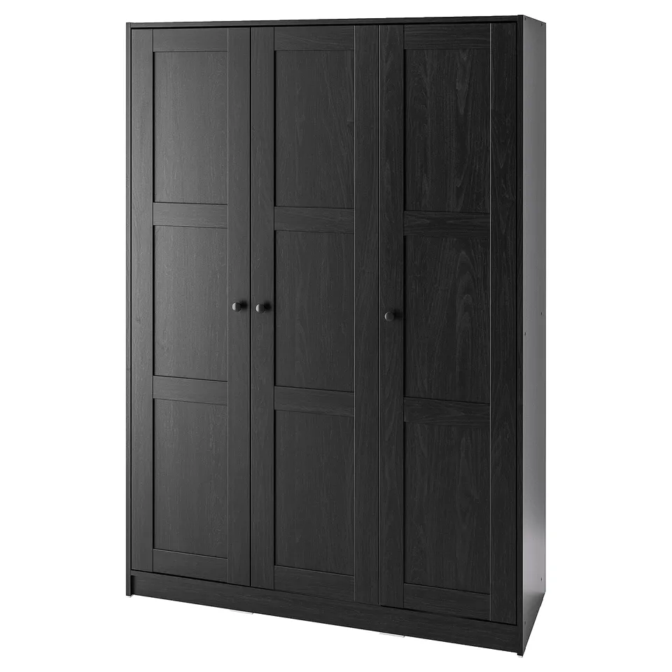 A black RAKKESTAD wardrobe with three doors, made of fibreboard and particleboard, featuring a simple and functional design.