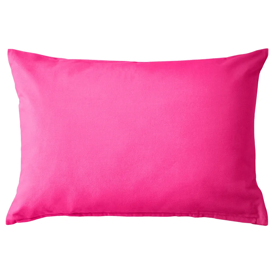 Bright pink rectangular throw pillow with smooth, solid colour surface and no patterns. Made of soft cotton velvet.