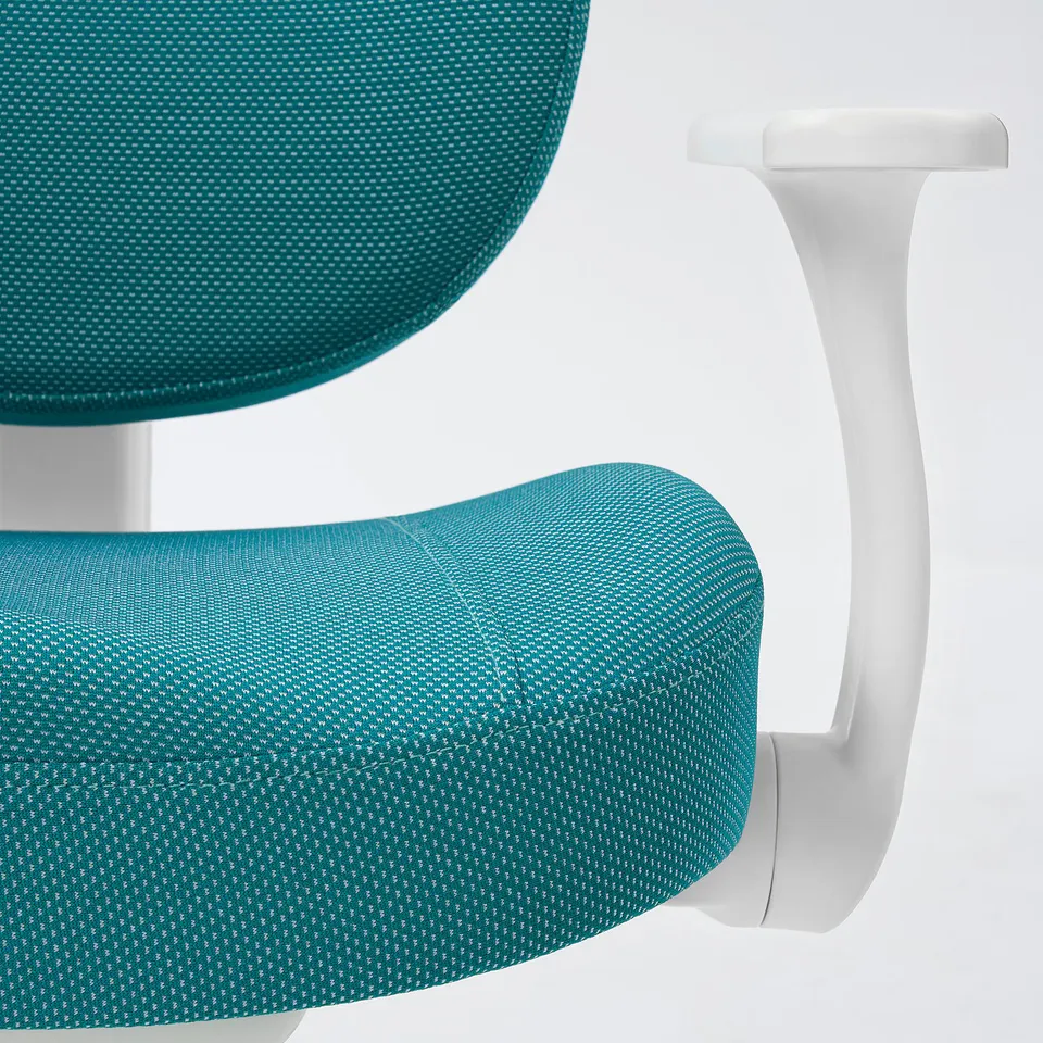 A close-up of a modern chairs back and armrest. Teal fabric, white plastic, high quality.