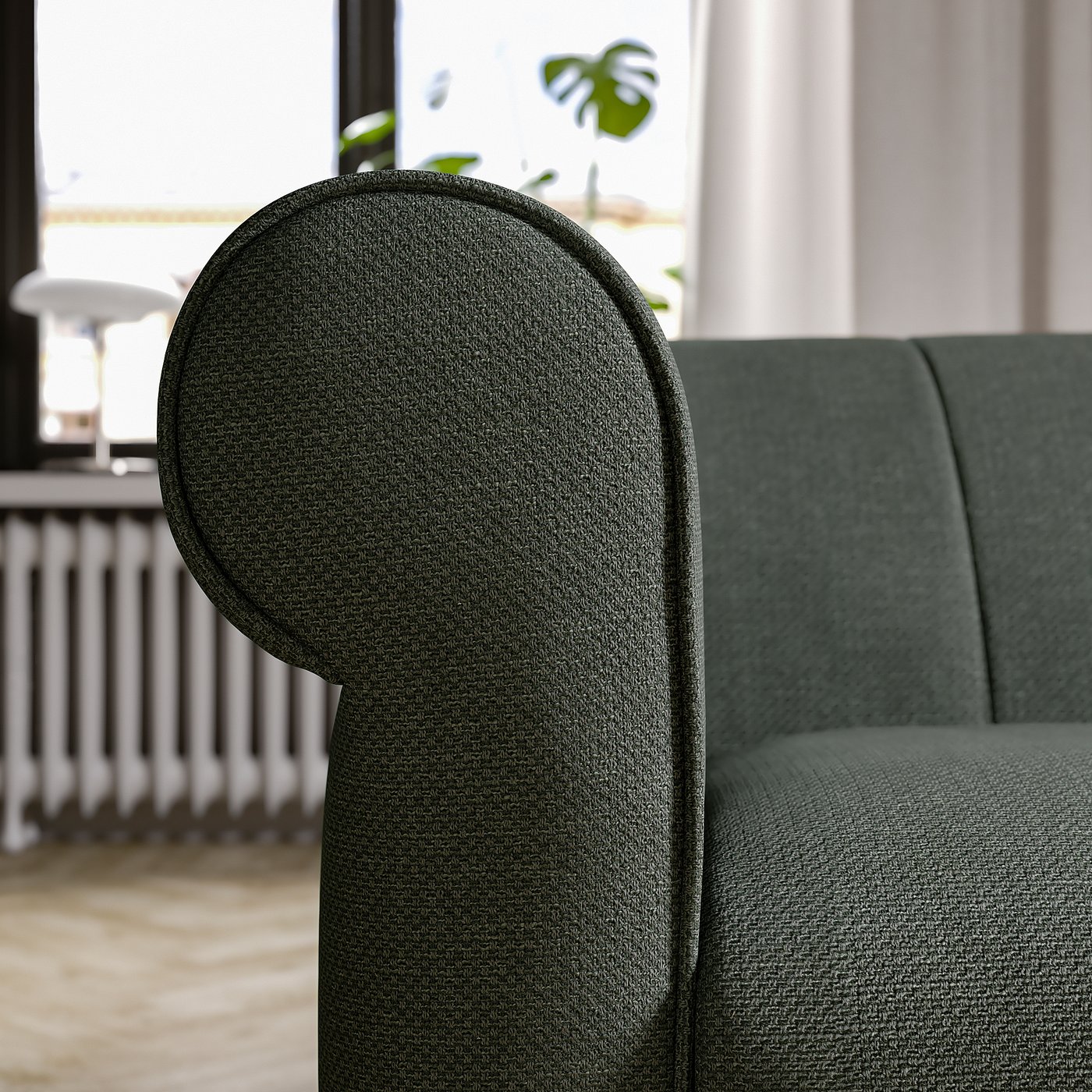 Dark green VISKAFORS sofa, rounded armrests, deep seats, classic design.