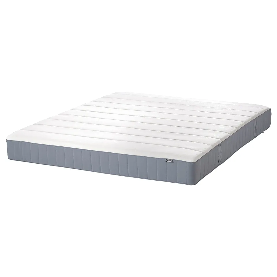 Grey upholstered bed, rectangular, clean lines, padded headboard.