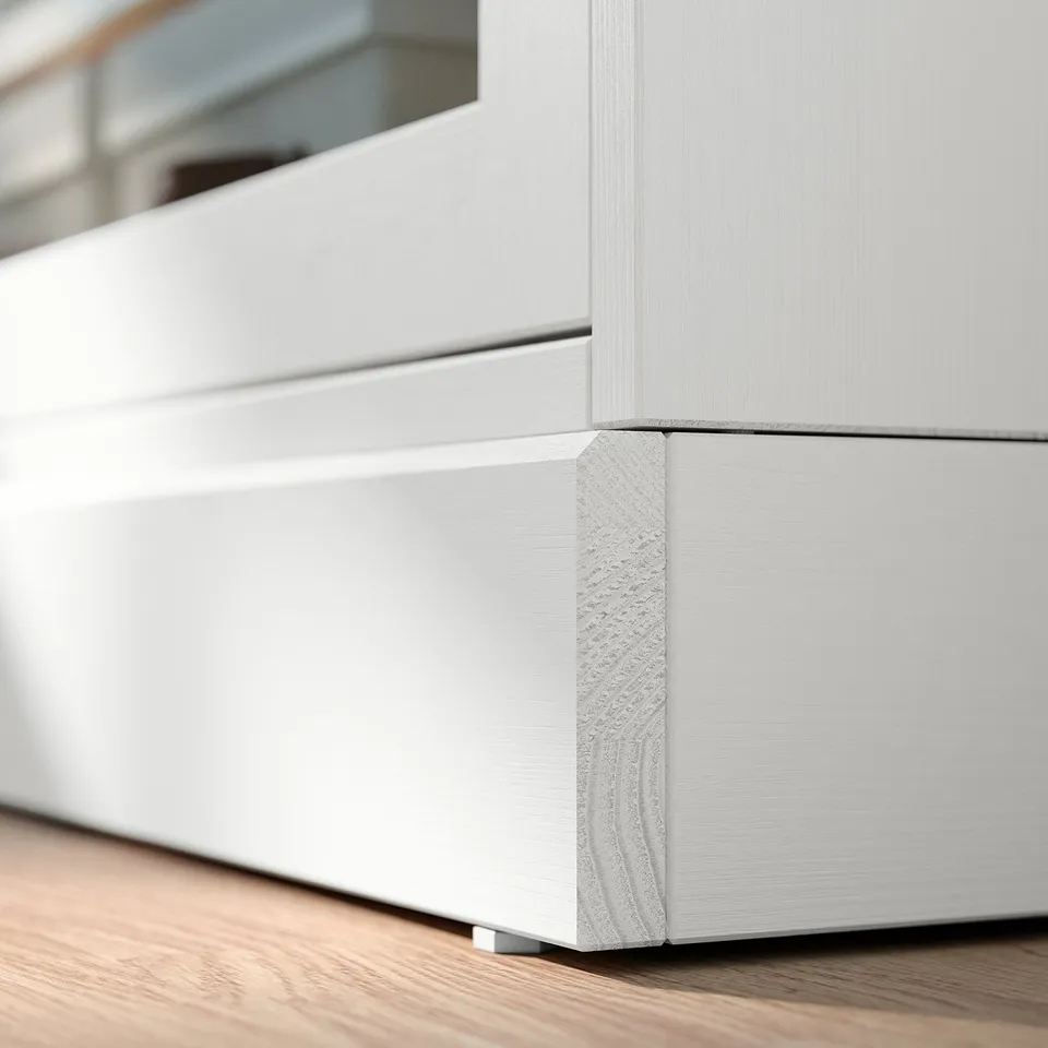 White wooden cabinet edge, brushed finish.