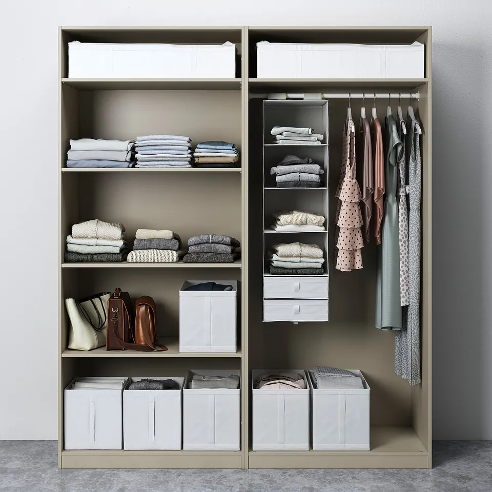 Organised wardrobe with shelves, folded clothes, hanging garments, and storage bins. Wardrobe includes sliding doors and adjustable interiors.