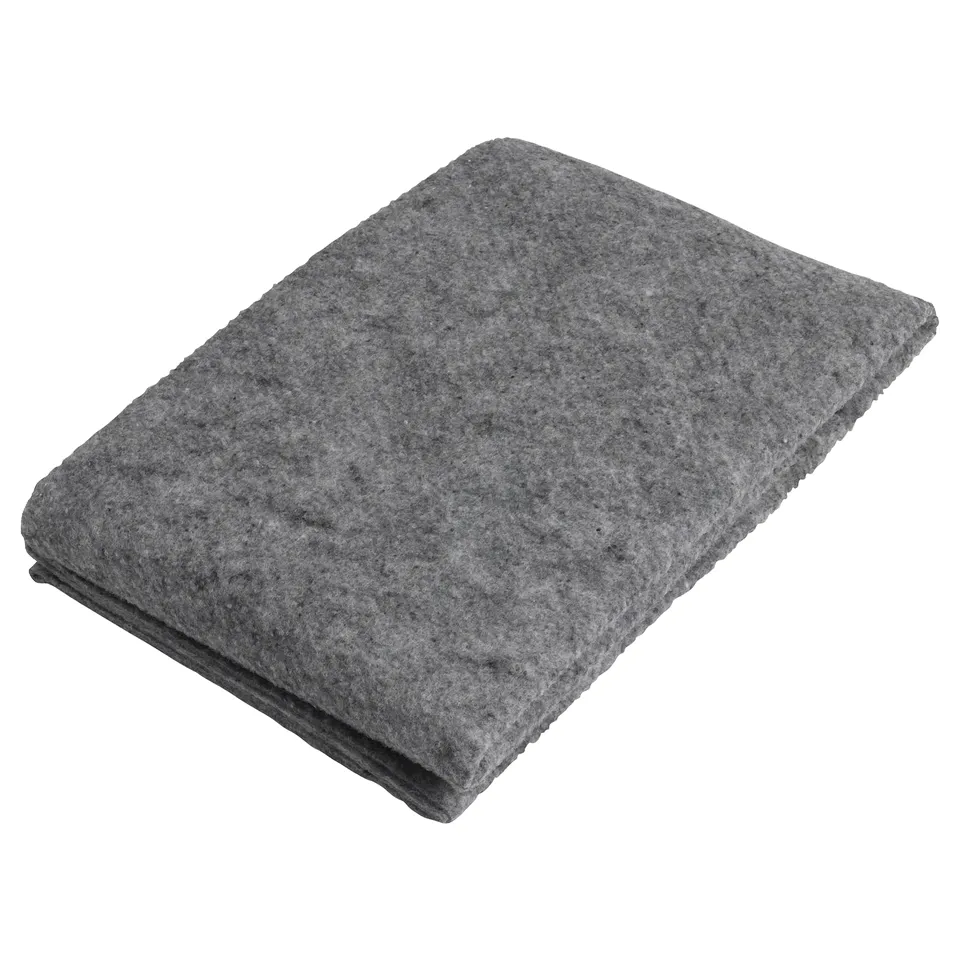 Stack of grey felt floor mats, rectangular, soft and textured.