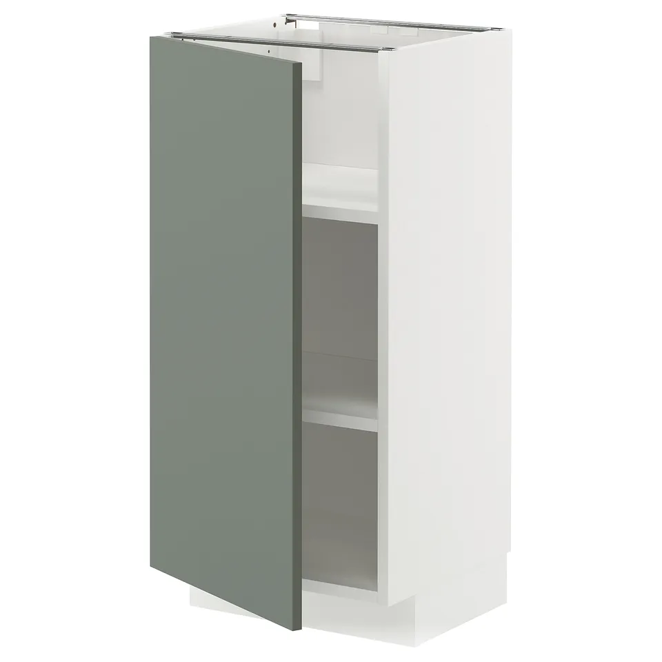 Modern kitchen cabinet with light green doors and white frame. Adjustable shelves and sturdy particleboard construction.