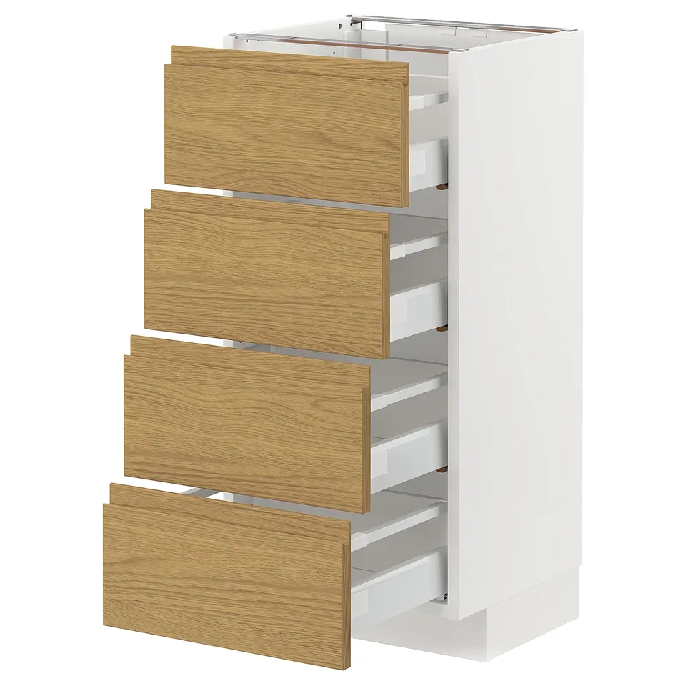 Ikea METOD kitchen cabinets with oak effect wood drawers. Sleek white and wooden design, four drawers.