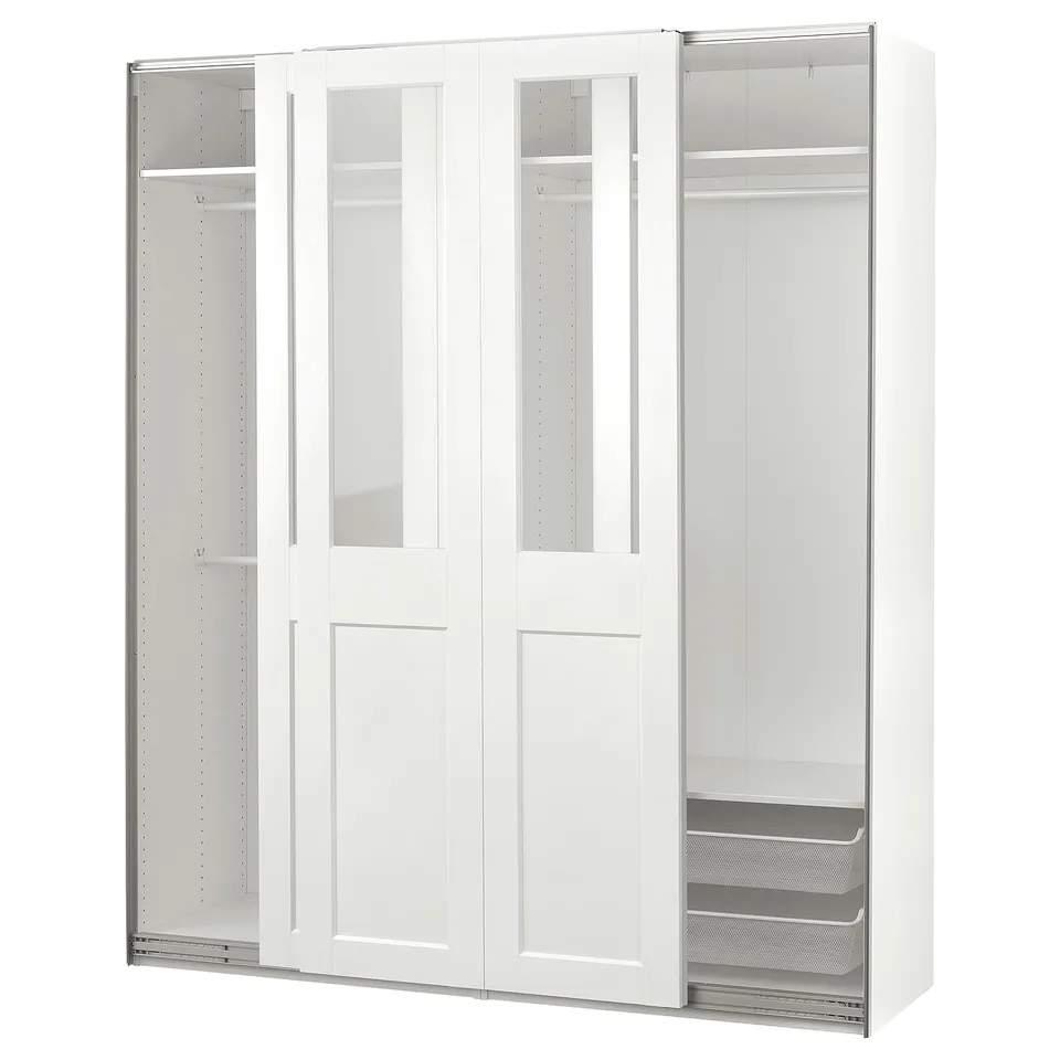 A white PAX wardrobe with glass doors, displaying an organised interior with shelves and hanging space.