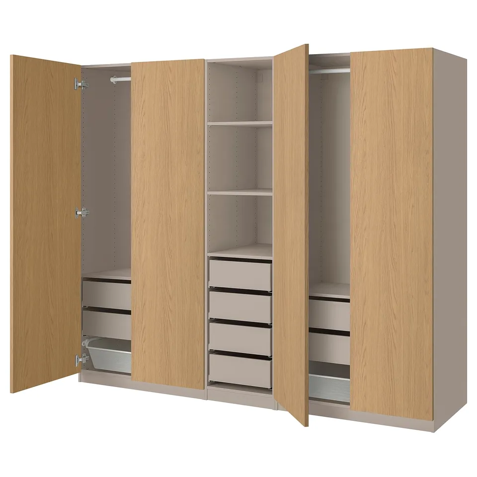 Beige PAX wardrobe with woodgrain doors, open revealing shelves and drawers.