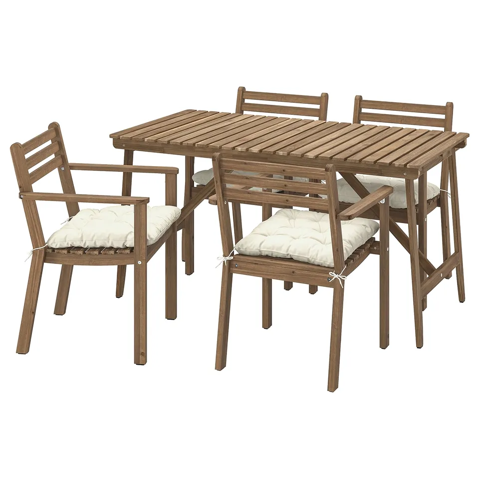 An ASKHOLMEN outdoor furniture set with a brown wooden table and four matching chairs, each with white cushions.