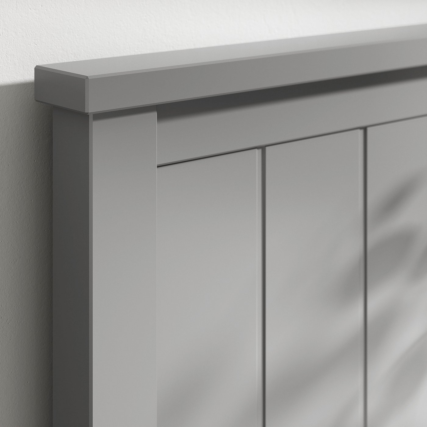 Close-up of modern bed frame corner, smooth edges, sleek finish. Clean design, sturdy construction.