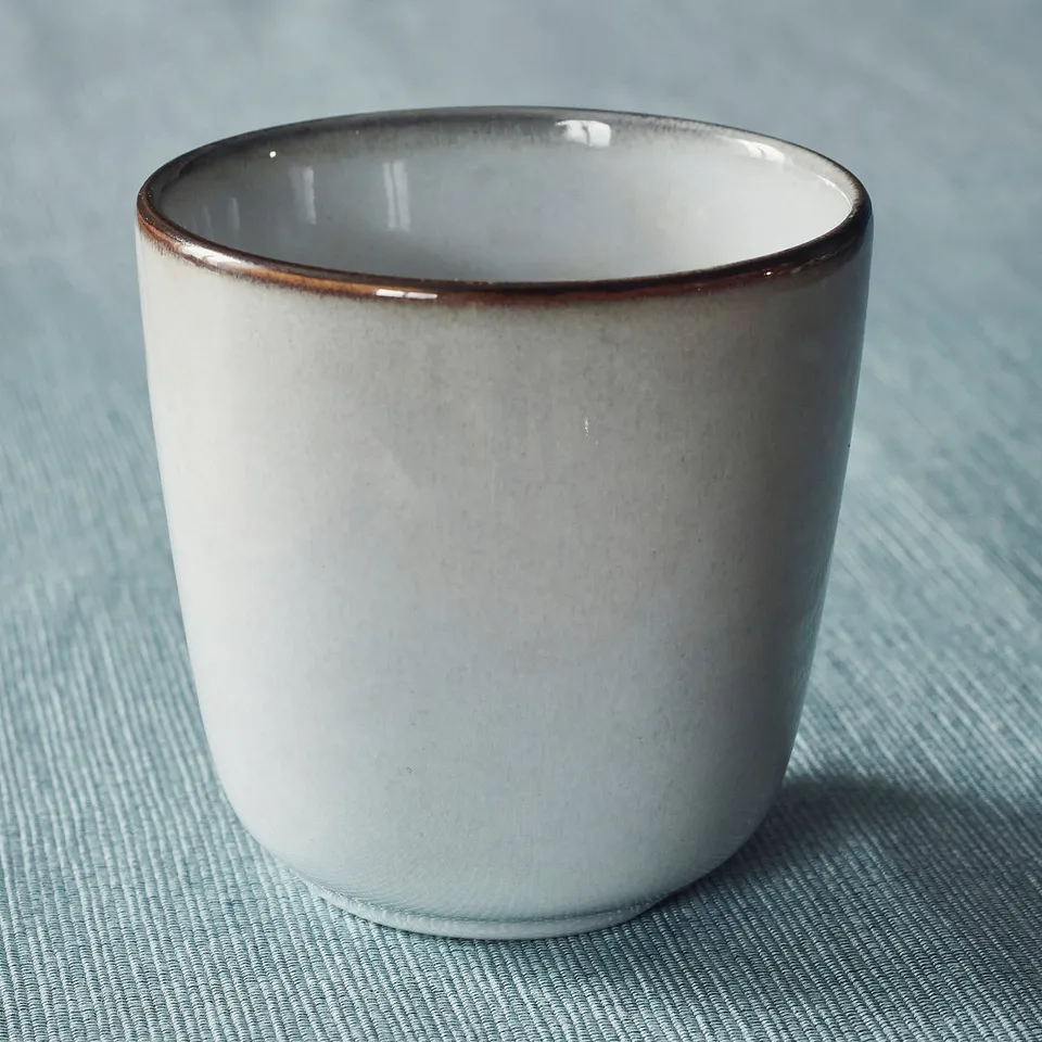 Cup on blue table