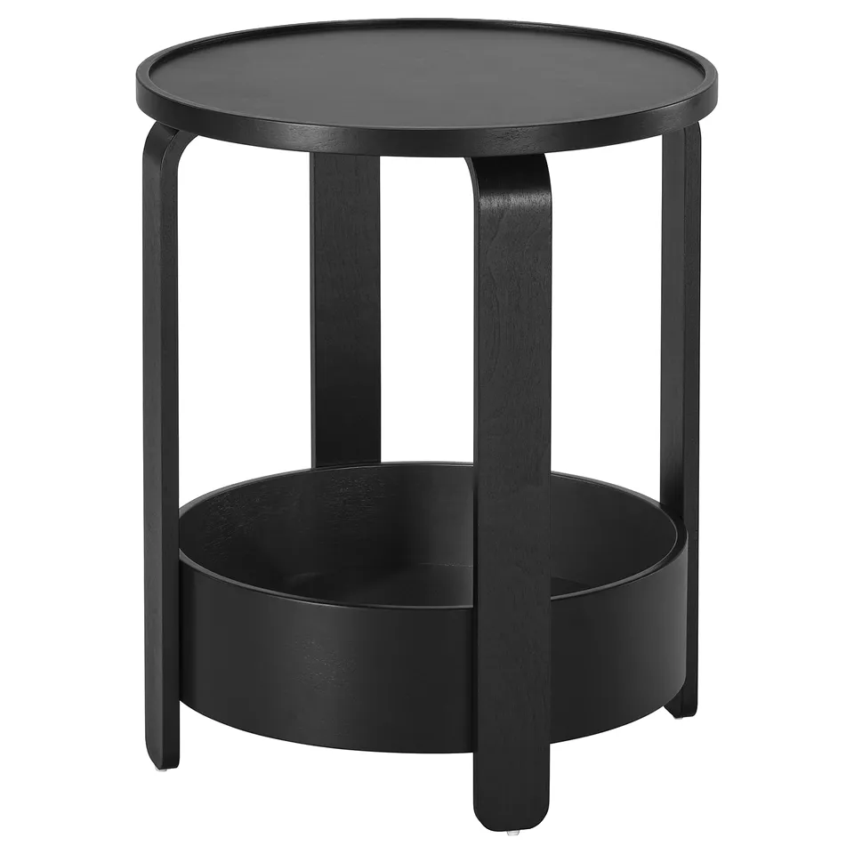 A black BORGEBY side table with a round top, four slim legs, and a lower shelf for storage. Its design is simple, elegant, and functional.