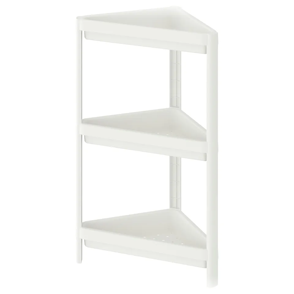 A white VESKEN corner shelf with two triangular shelves for storage.