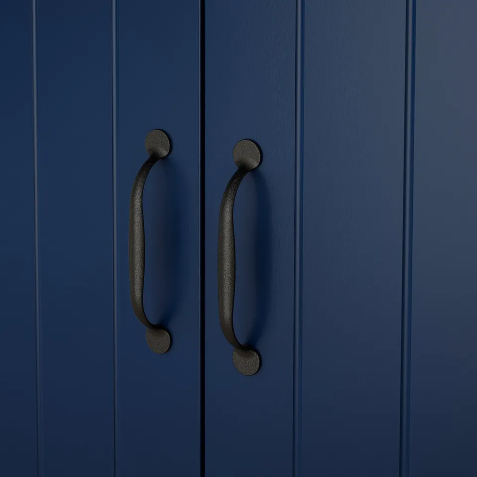Dark blue wooden doors with sleek, black, curved handles.