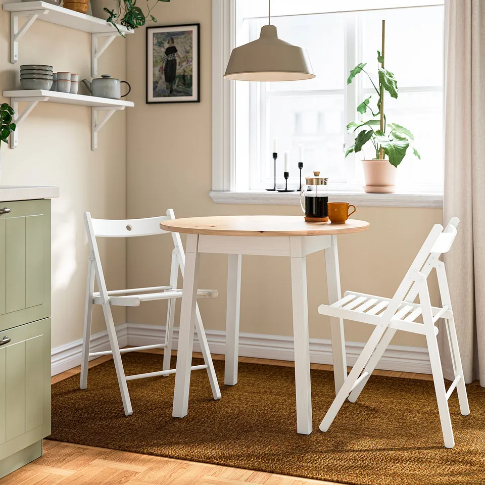 PINNTORP / FRÖSVI Table and 2 folding chairs, light brown stained white stained/pine white, 85 cm