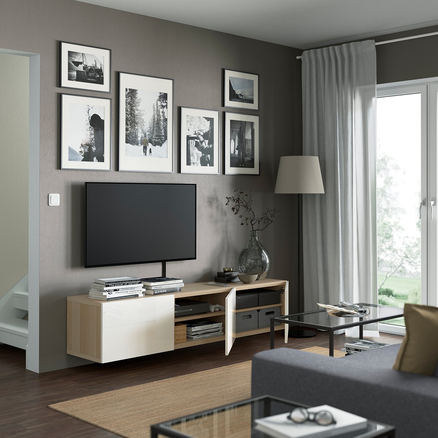 Modern living room with wall-mounted tv unit, soft-close drawers, and adjustable shelves.