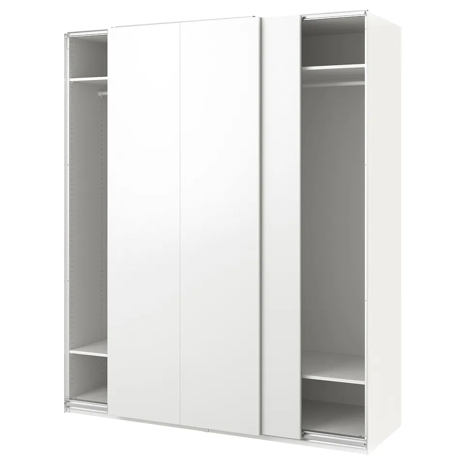 White PAX wardrobe with sliding doors. Modern, minimalist design. Made of fibreboard and particleboard. Includes shelves and rail.