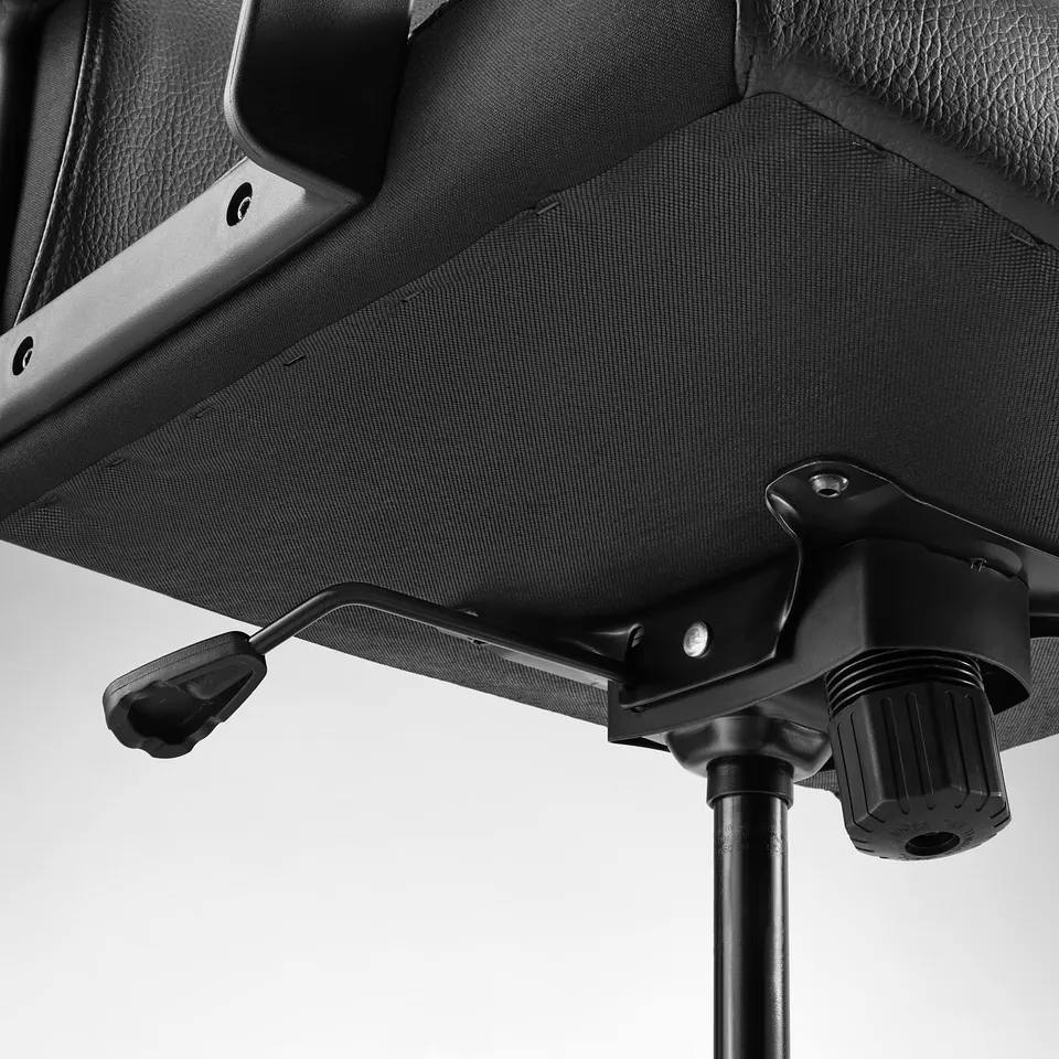 Close-up of a high-quality office chairs adjustment mechanism and base, showcasing sturdy parts and sleek design.