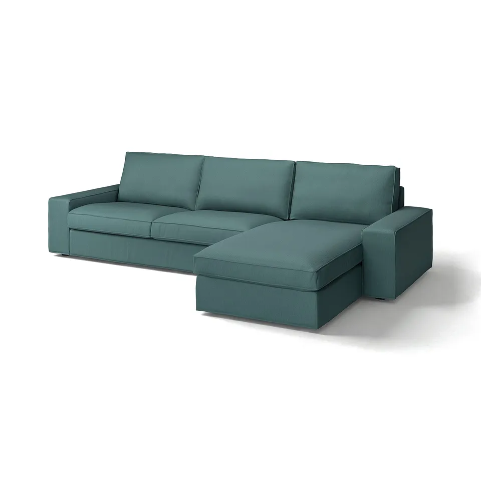 A modern teal KIVIK sectional sofa with a relaxed design, featuring a chaise and plush cushions for comfort.
