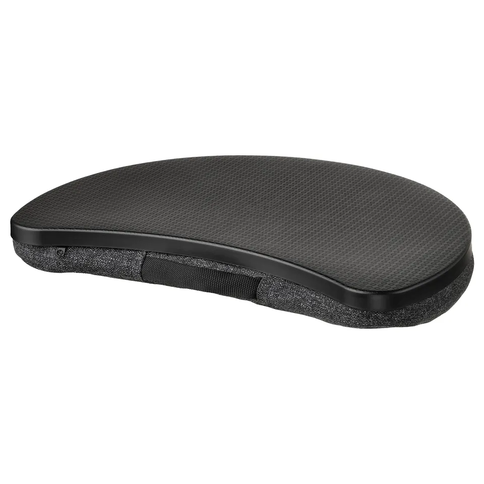 Black, portable laptop cushion. Curved, supportive design, perfect for flexible workspaces.