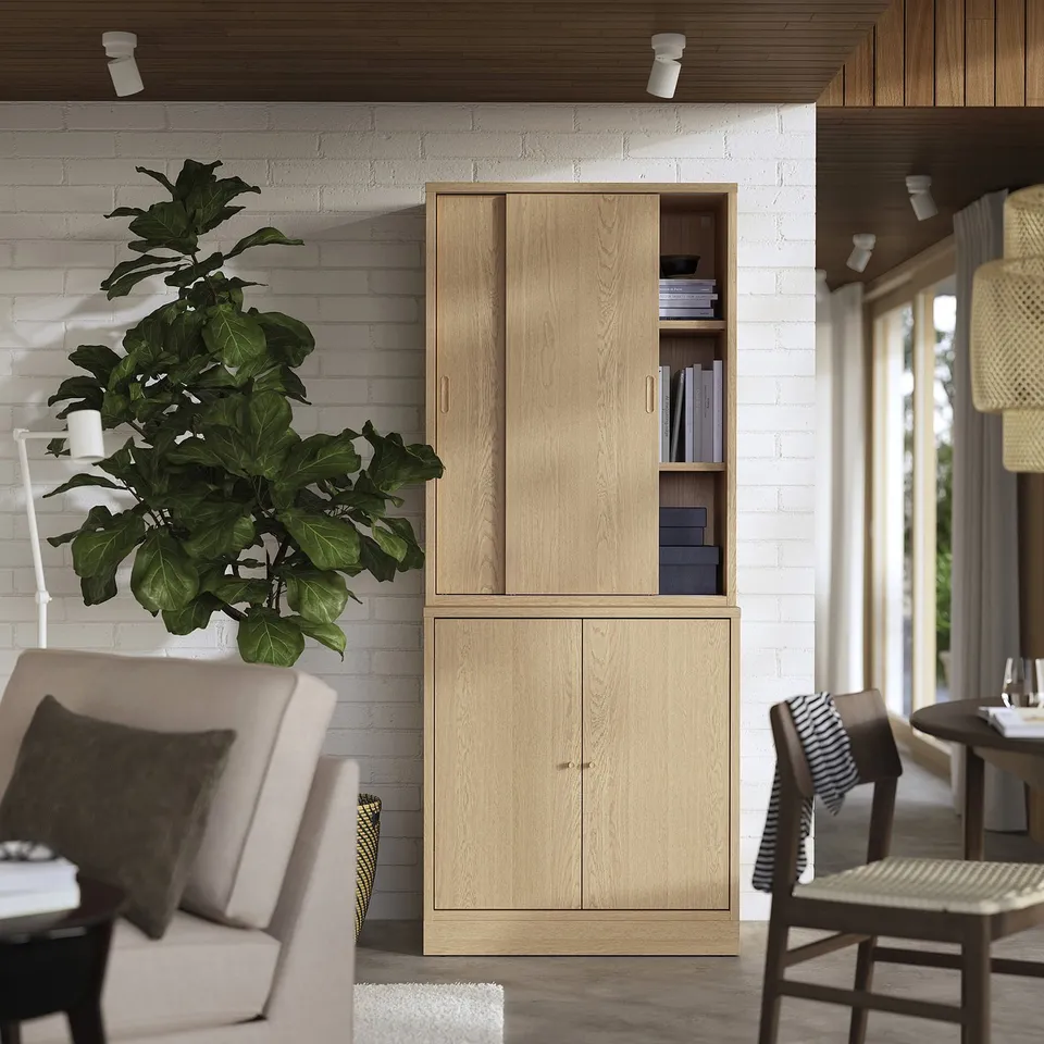 TONSTAD cabinet: light wooden unit with adjustable shelves, minimalist design, integrates into modern living space.