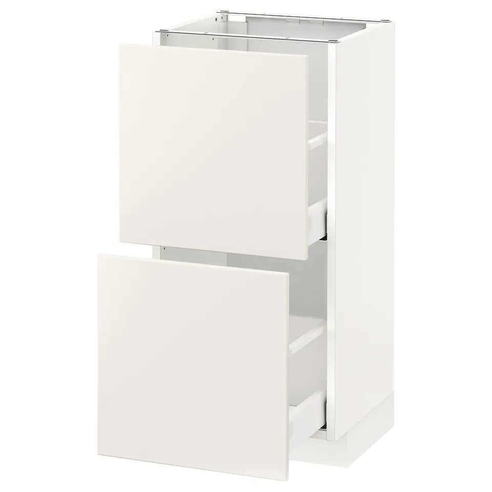 White METOD kitchen unit with two drawers. Sleek, modern design with glossy finish.