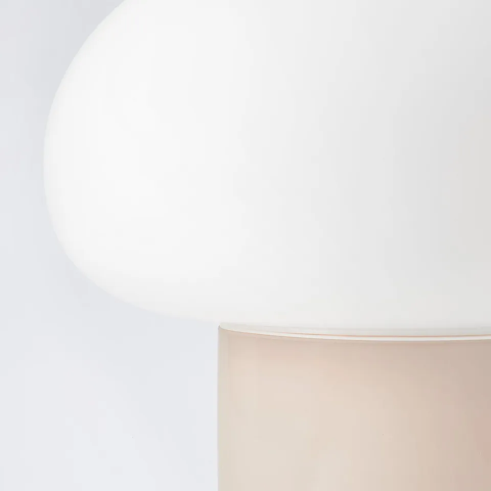 Elegant lamp with chrome & soft glass shade.