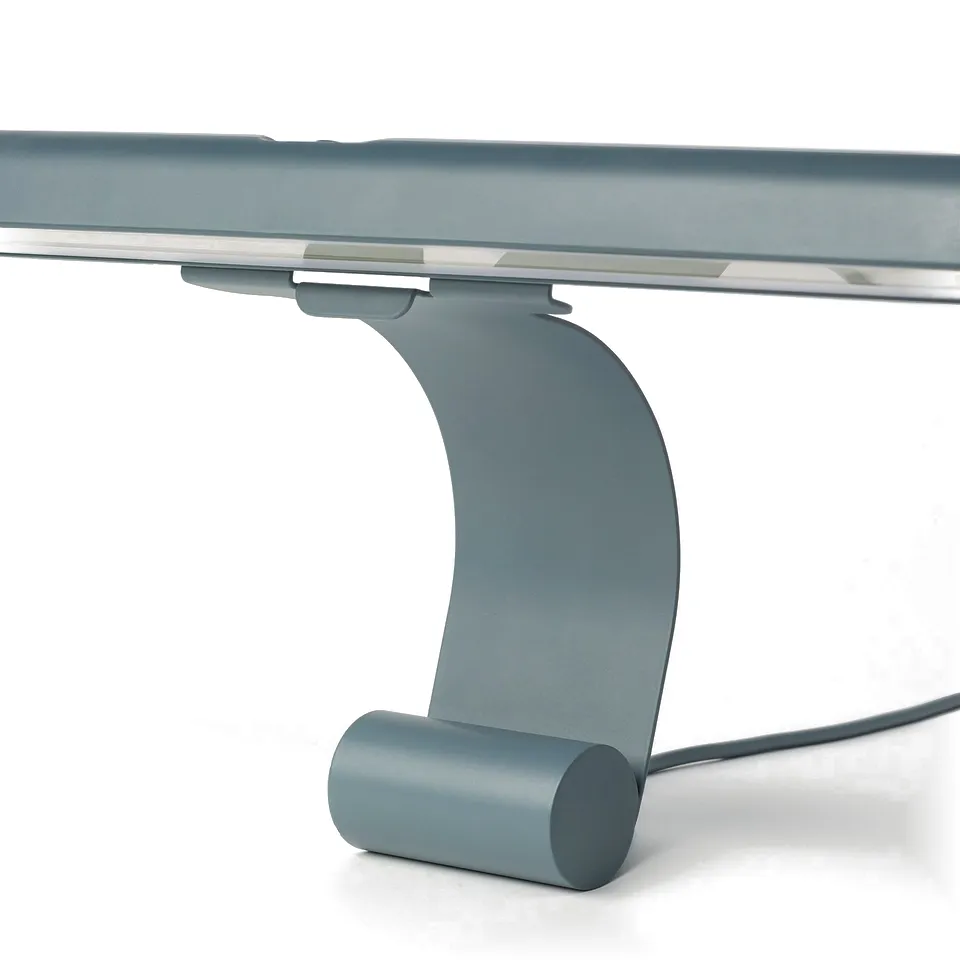 Modern led lamp with curved design, magnetic attachment, and usb-c cable.