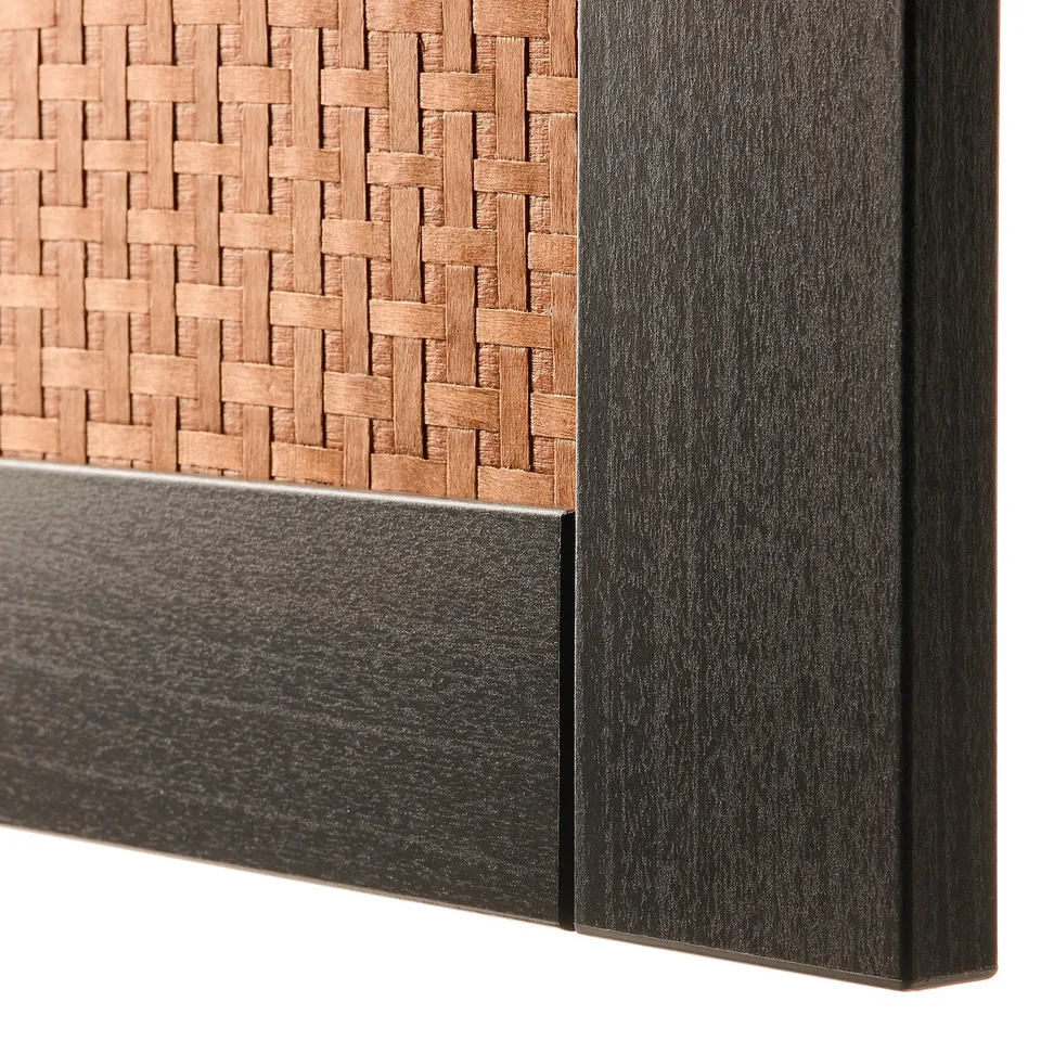 Close-up of woven wood texture and dark frame - stylish and well-crafted storage solution.