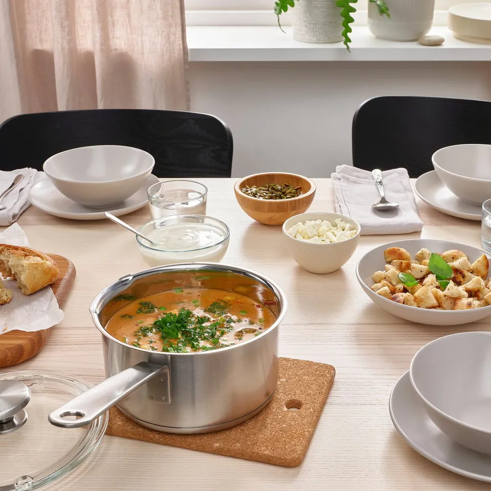 Soup, bread, bowls, parsley.