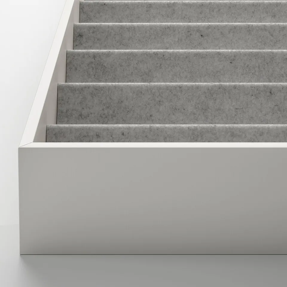 Sleek grey steps, white railing, minimalist design.