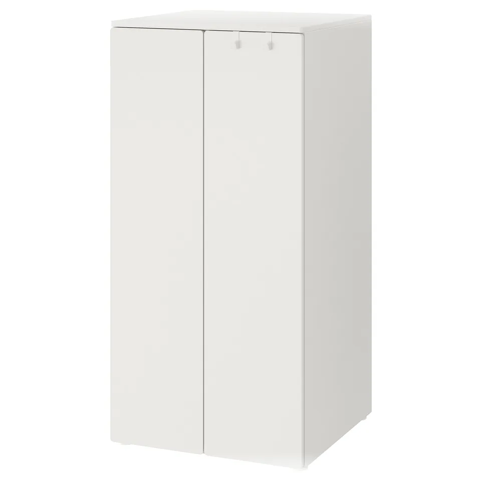 White SMÅSTAD kids wardrobe; tall, rectangular, with two soft-close doors.