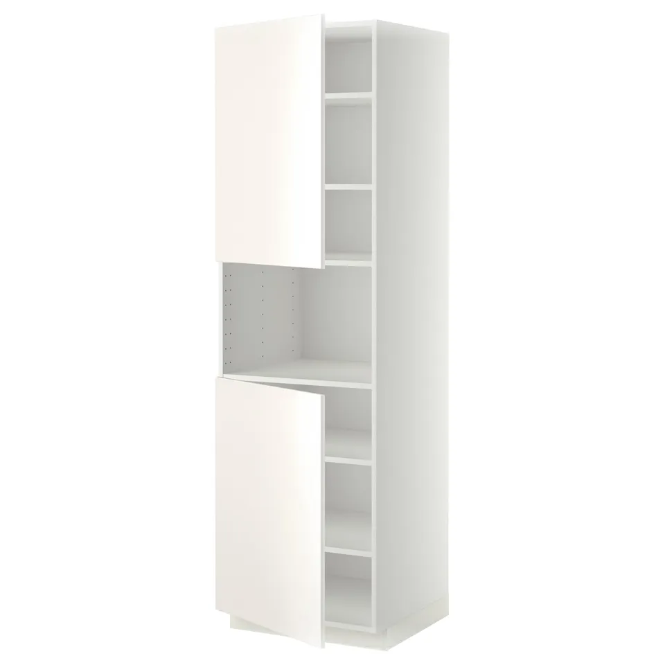 A white METOD kitchen cabinet with adjustable shelves. It a sleek, smooth design and sturdy construction.