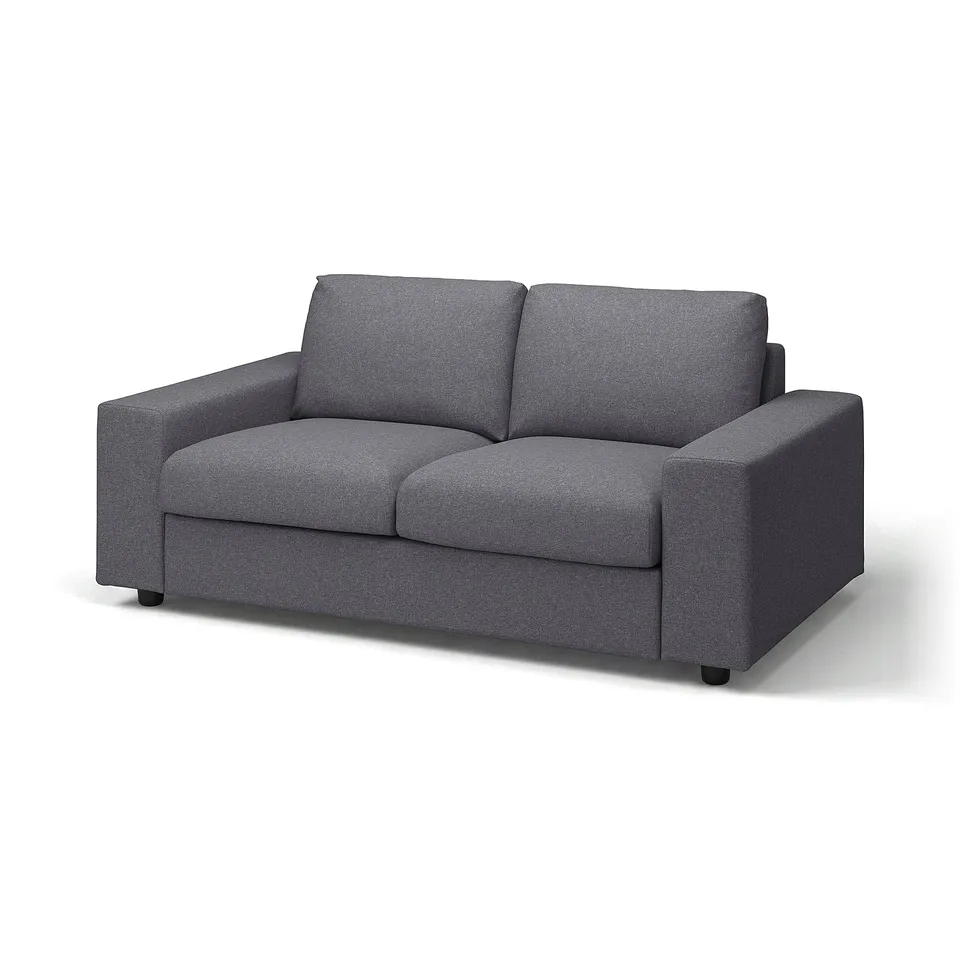 Grey VIMLE sofa, modern minimalist design with clean lines, plush cushions, low profile.