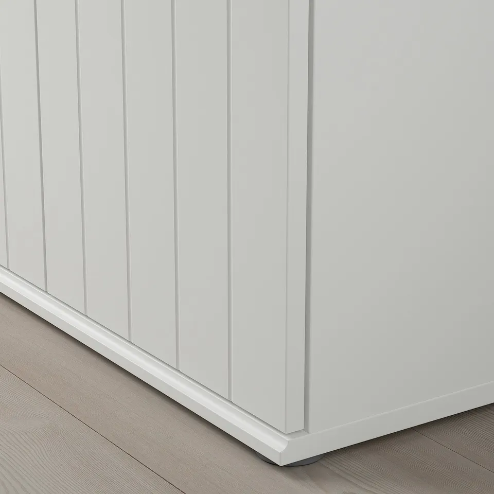 SKRUVBY cabinet corner, sleek grooved doors, sturdy, clean lines, oak top with wooden floor.