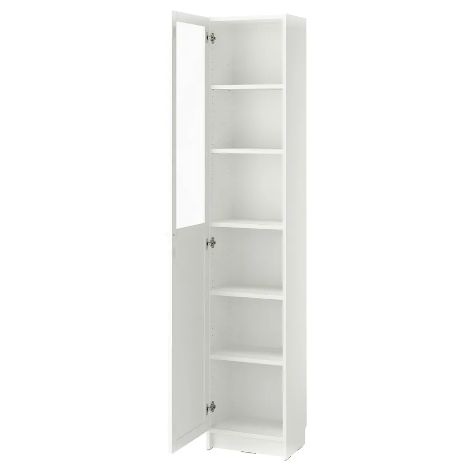 A white BILLY bookcase with glass doors, standing tall and rectangular, offering versatile storage.